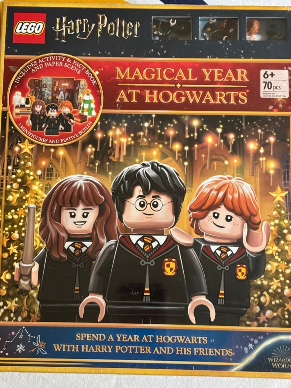 Hardcover "Magical Year at Hogwarts" INCLUDES 3 unassembled Harry Potter minifig